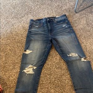 Dark blue ripped American eagle jeans